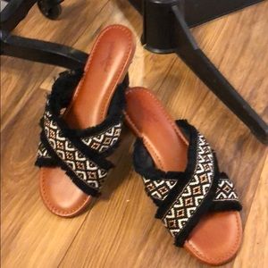 Black and gold sandals